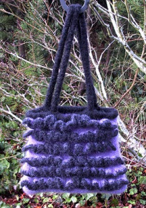 This crochet felted bag is stylish and perfect for events from weddings to funerals and everyday use. And because it's felted, it will definitely be strong and durable.